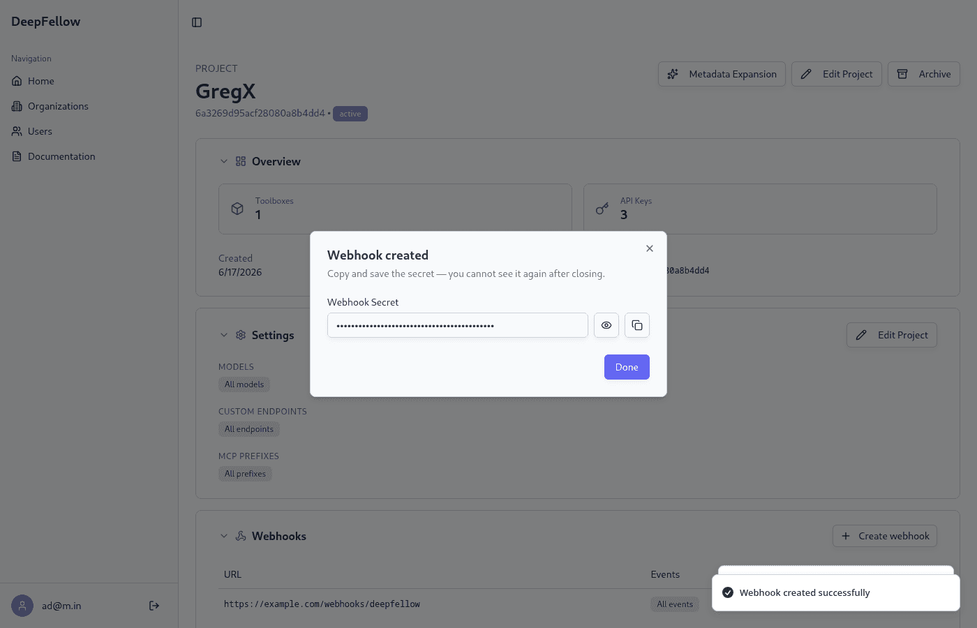 pop-up window showing a newly created webhook endpoint's secret, and the endpoint listed below it.
